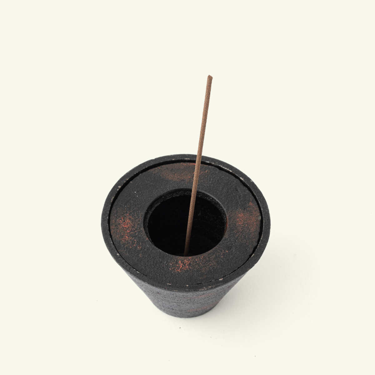 Minimalist Japanese cast iron incense burner for incense sticks