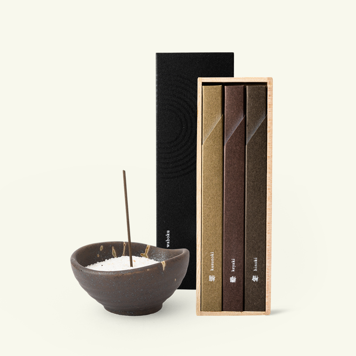 Complete Japanese incense ritual set with Kousaido Wabuko trio incense, a ceramic Oribe incense holder, and marble sand.