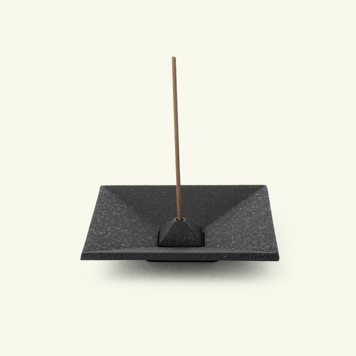 Black Japanese cast iron incense holder with integrated ash catcher tray, mini square design for burning incense sticks.