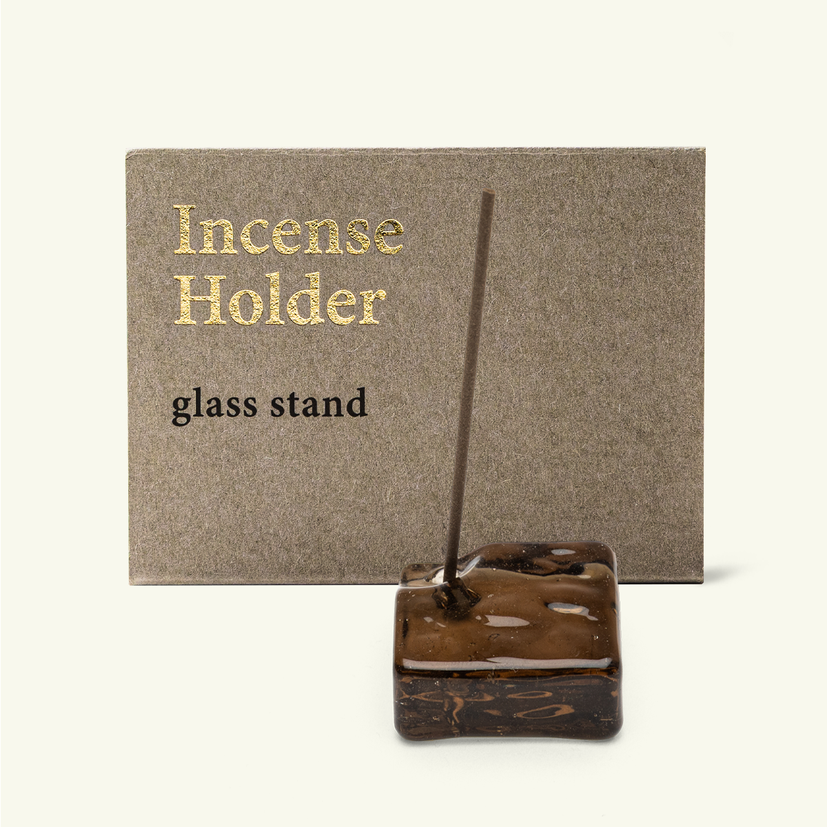 Kousaido amber glass Japanese incense holder shown with original packaging