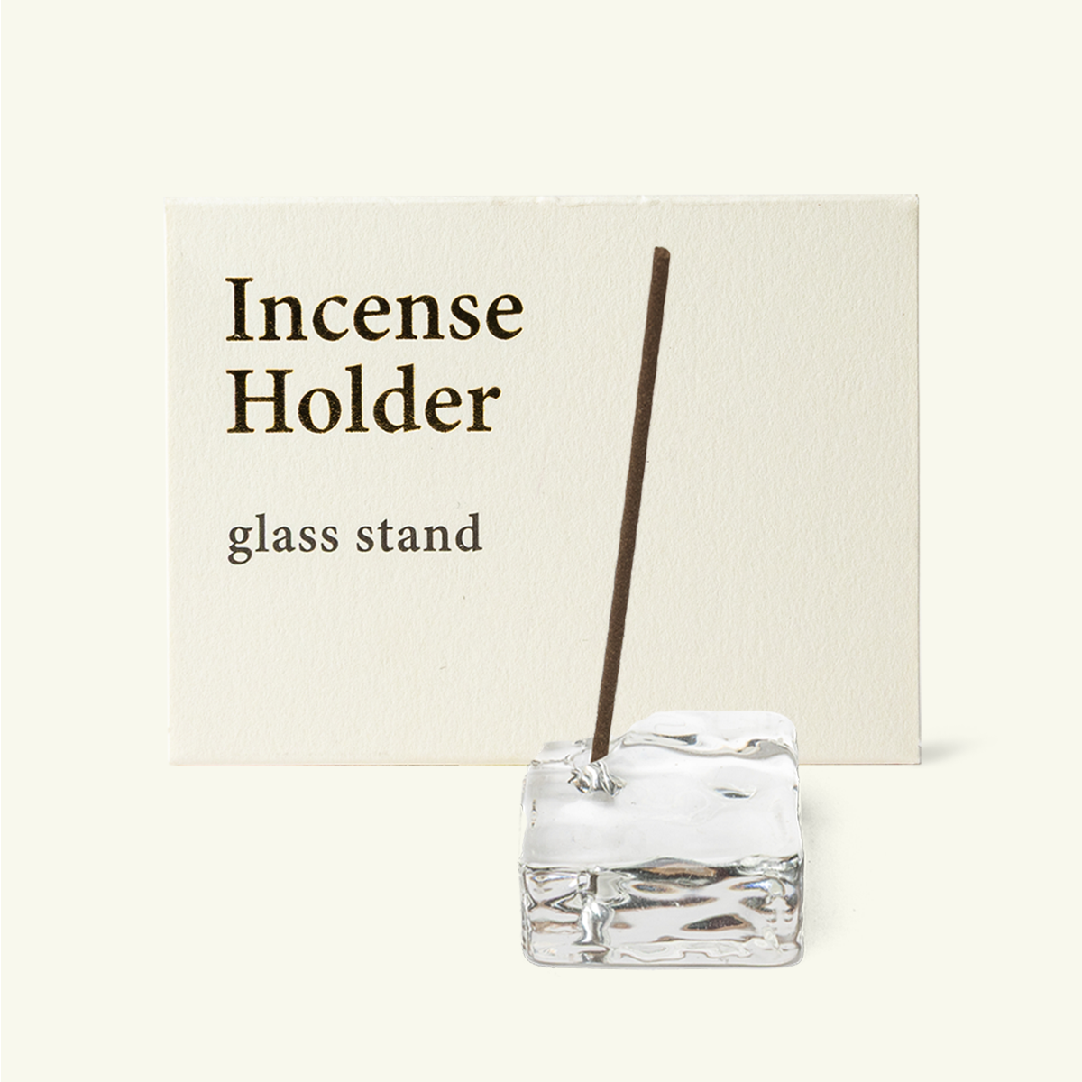 Kousaido clear glass Japanese incense holder shown with original packaging