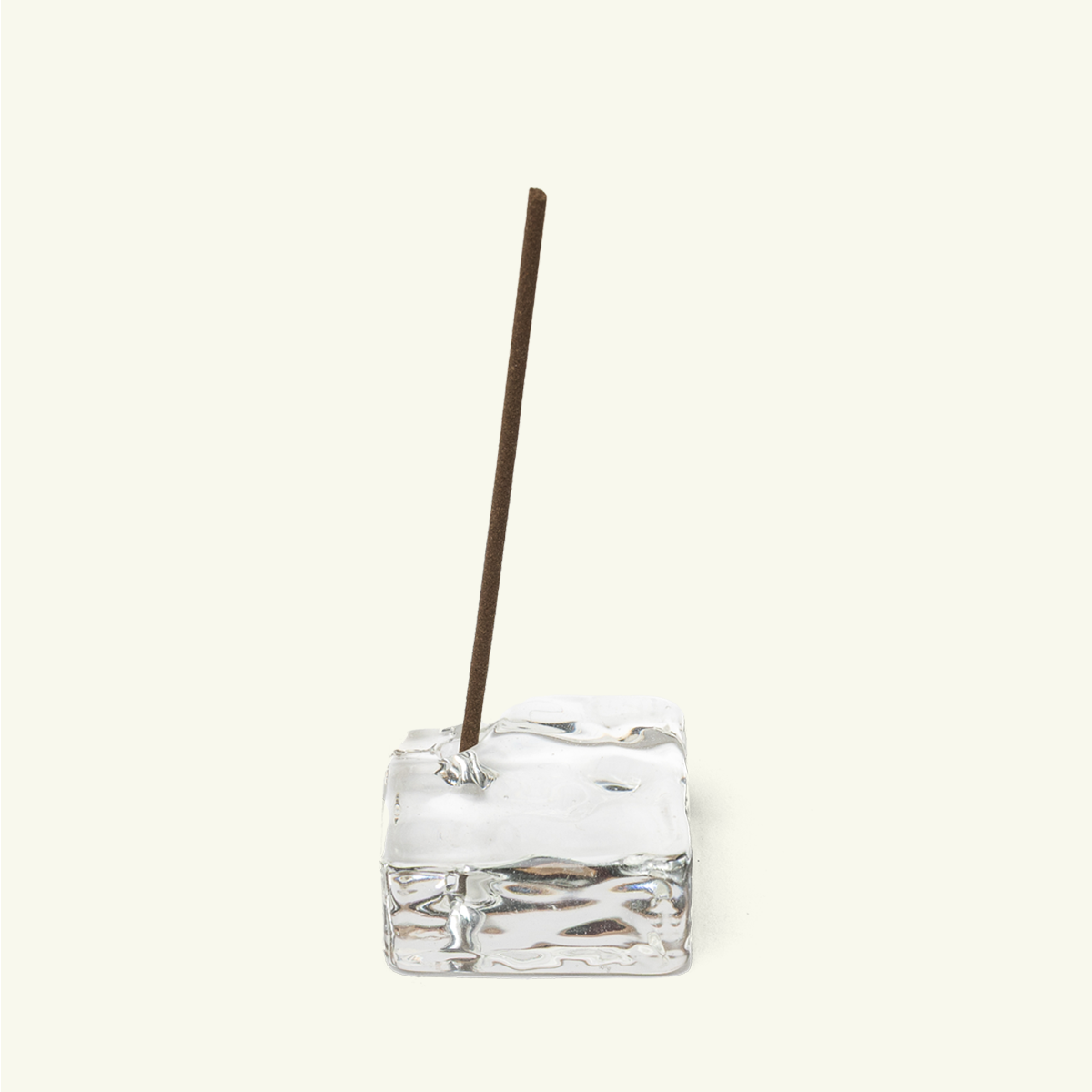 Clear glass Japanese incense holder by Kousaido with minimal organic design