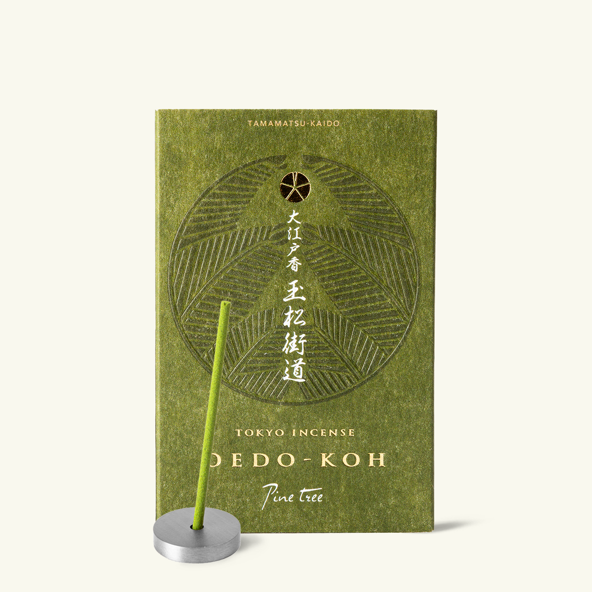 Green incense stick with packaging featuring Japanese text on a white background by Nippon Kodo, Oedo koh collection